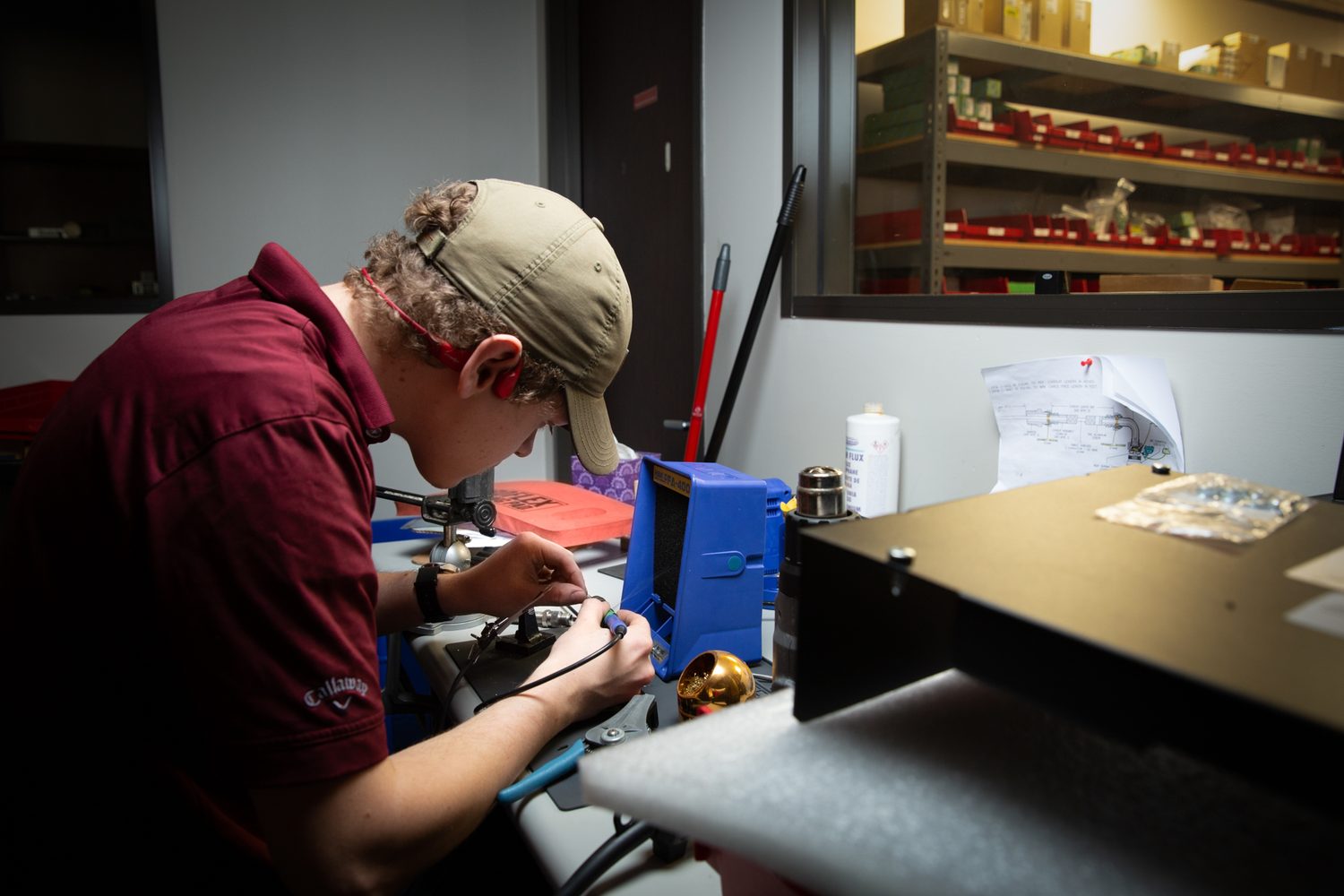Drake Controls technician performing bench repair on a component